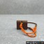 Miu Miu Leather, cord, and metal trick with mini-pouch bag 5TL515 Cognac/Orange 2024