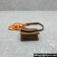 Miu Miu Leather, cord, and metal trick with mini-pouch bag 5TL515 Cognac/Orange 2024