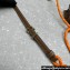 Miu Miu Leather, cord, and metal trick with mini-pouch bag 5TL515 Cognac/Orange 2024