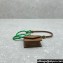 Miu Miu Leather, cord, and metal trick with mini-pouch bag 5TL515 Cognac/Green 2024