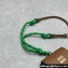 Miu Miu Leather, cord, and metal trick with mini-pouch bag 5TL515 Cognac/Green 2024