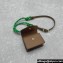 Miu Miu Leather, cord, and metal trick with mini-pouch bag 5TL515 Cognac/Green 2024