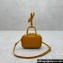 Miu Miu Leather micro bag 5NR036 Cognac 2024