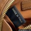 Miu Miu Leather micro bag 5NR036 Brown 2024