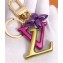 Louis Vuitton New Wave Bag Charm and Key Holder M63749 Pink/Yellow/Purple 2018