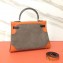 Hermes Kelly 32 Bag in Print Leather in Print Leather Orange/Black/Suede Coffee