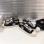 Chanel Logo Print Canvas Sneakers Black 2019