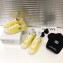 Chanel Logo Print Canvas Sneakers Yellow 2019