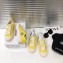 Chanel Logo Print Canvas Sneakers Yellow 2019