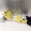 Chanel Logo Print Canvas Sneakers Yellow 2019
