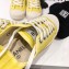Chanel Logo Print Canvas Sneakers Yellow 2019