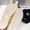 Chanel Logo Print Canvas Sneakers Yellow 2019