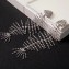 Saint Laurent Crystal Smoking Fish Bone Earrings In Silver-Tone Metal 542373